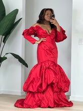 Load image into Gallery viewer, Three-quarter pose showing the fitted bodice and sculptural red taffeta balloon hem.