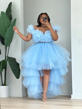 Load image into Gallery viewer, Three-quarter view of the sky-blue layered high-low tulle skirt and matching ruffled top.