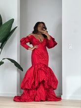 Load image into Gallery viewer, Front view showing the curve-fitting red mermaid bodice and exaggerated taffeta skirt.