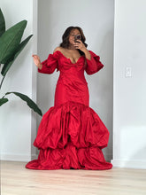 Load image into Gallery viewer, Full-length front view of the red taffeta mermaid gown with its dramatic floor-sweeping skirt.