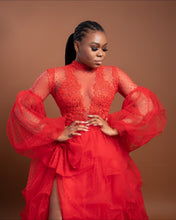 Load image into Gallery viewer, Full-length view showing the fitted red lace silhouette and dramatic high slit.
